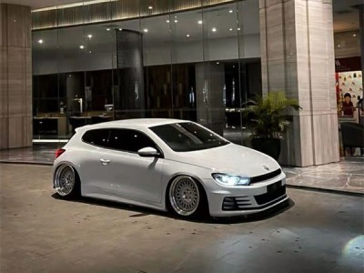 Pearl white Volkswagen Scirocco aimgain trendy low wind