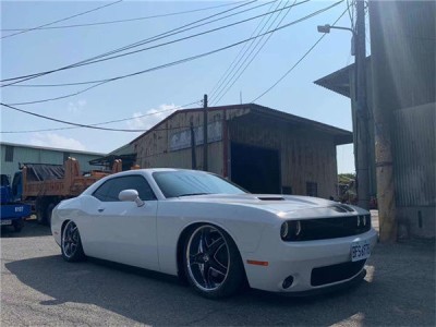 Muscular sports car Dodge challenger aimgain low profile